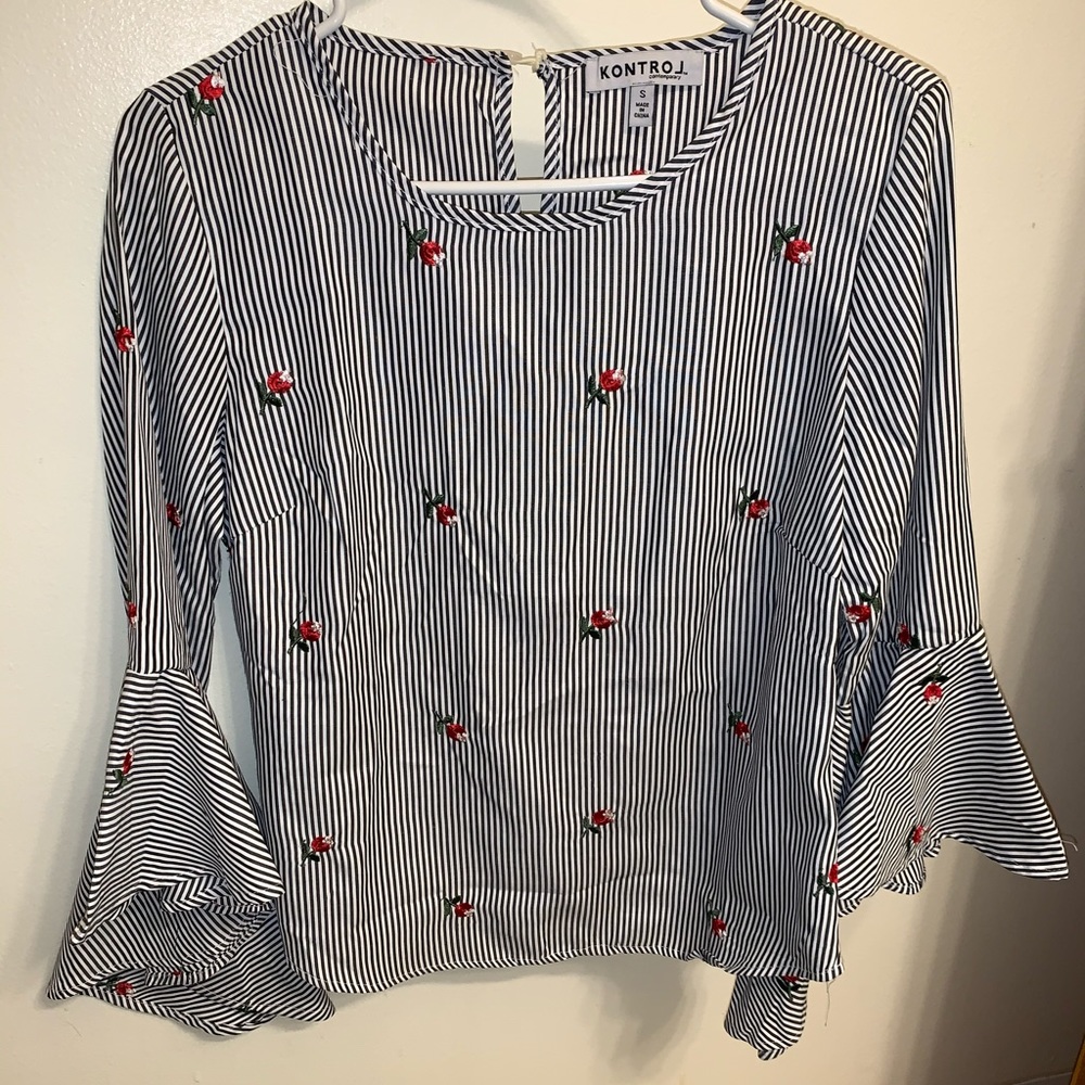 Striped  blouse with rose details